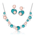 KC gold plated hand-painted enamel necklace and earring set on white background