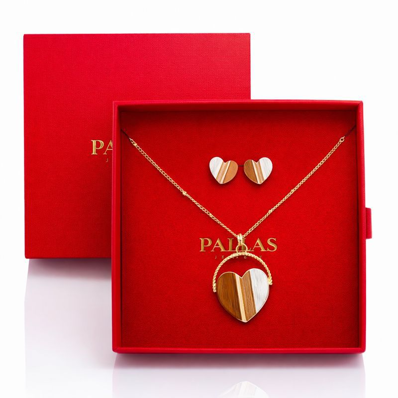KC gold plated enamel necklace and earrings set displayed in red gift box