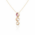 KC gold plated necklace and earrings set with hand painted enamel worn by model