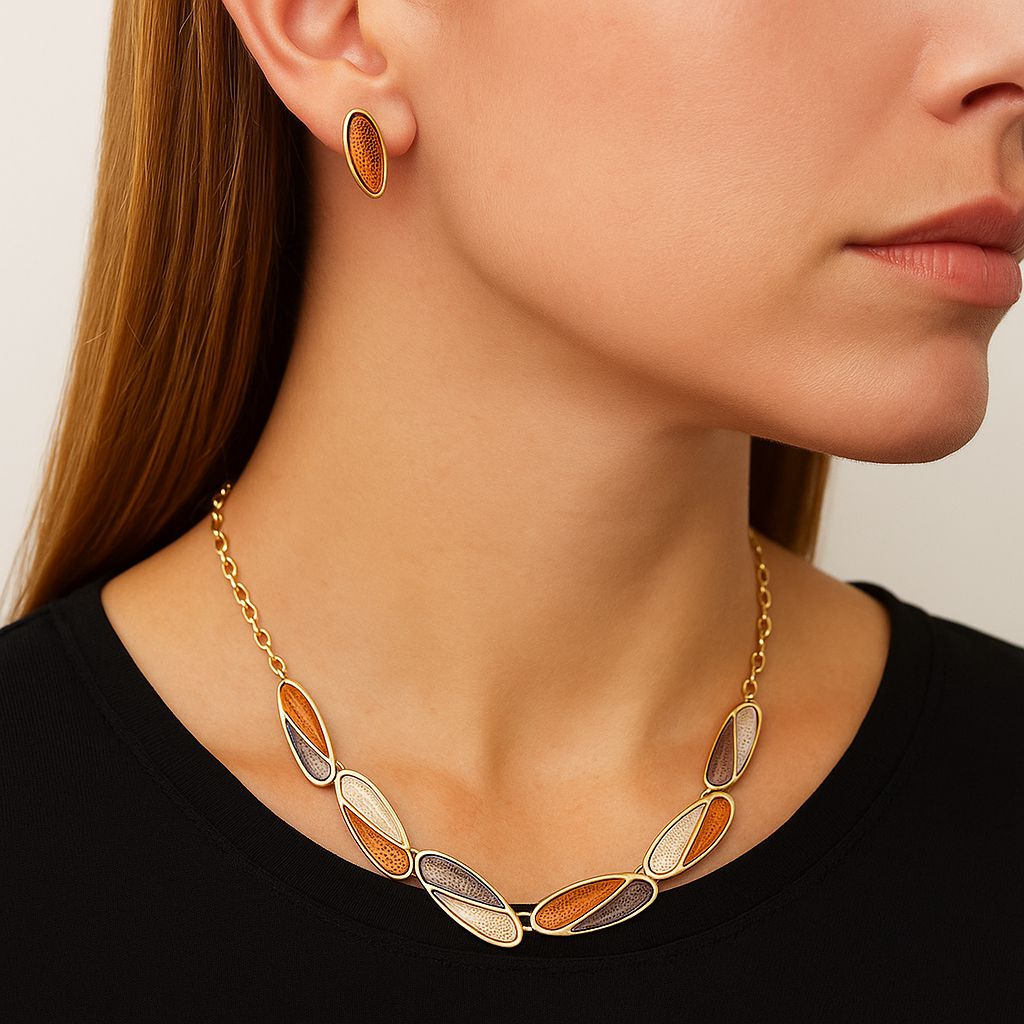 Hand-painted enamel necklace and earrings worn by model