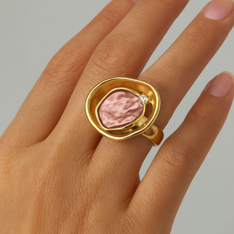 Close-up of hand-painted enamel surface on KC gold ring