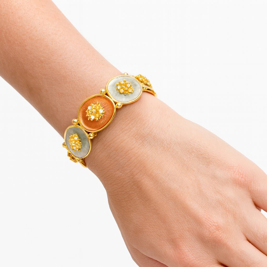 KC gold plated floral bangle detail close-up