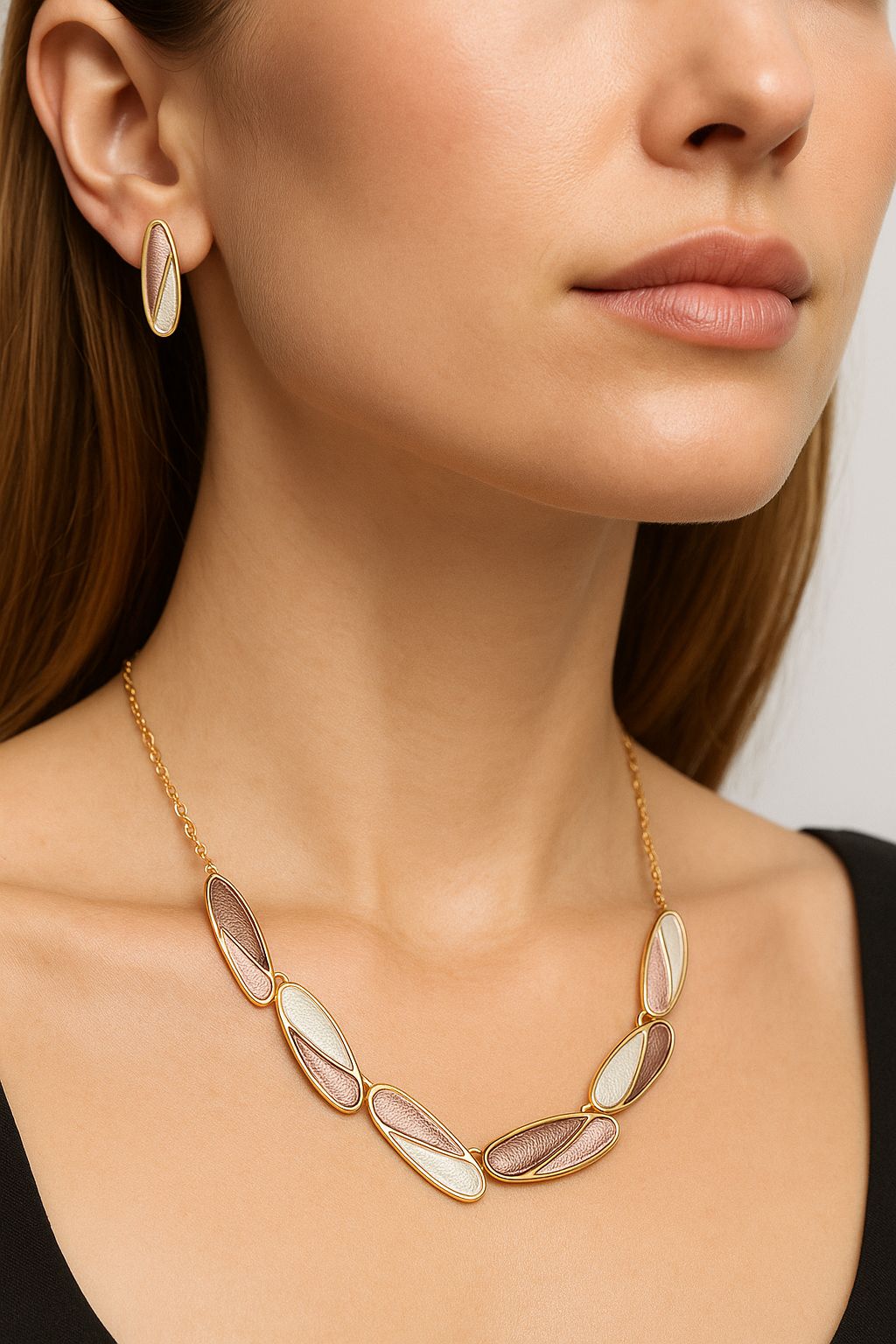 Hand-painted enamel earrings with KC gold plating and sculptural design