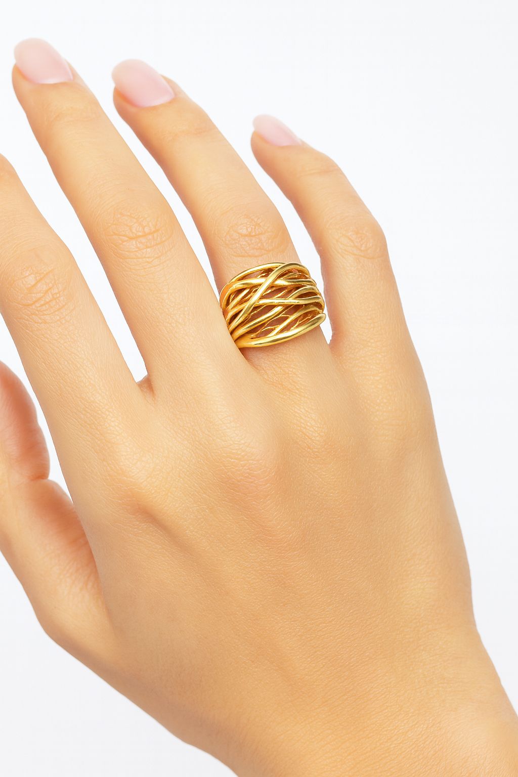 Women wearing textured KC gold statement ring on hand