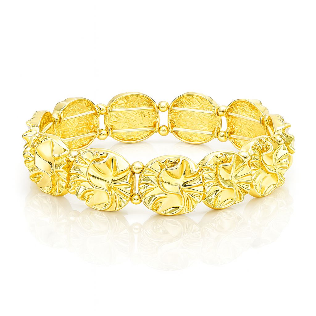 Side view of gold plated alloy bracelet featuring carved round motifs