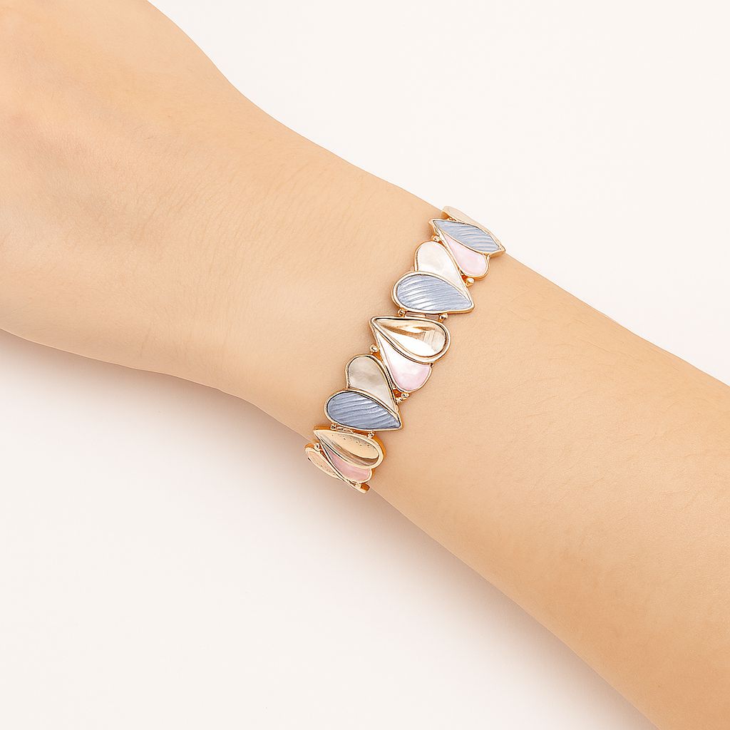 Hand-painted enamel heart bracelet featuring glossy shell-like finish