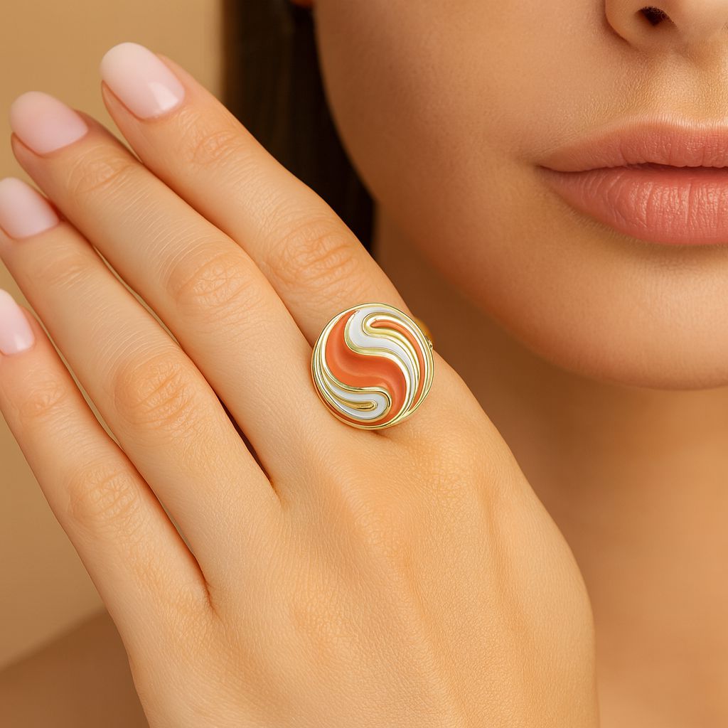Hand model wearing round swirl enamel ring
