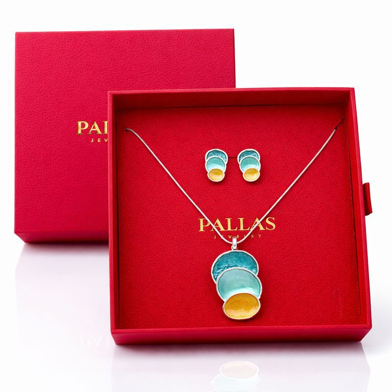 Layered enamel disc necklace and earrings set presented in gift box