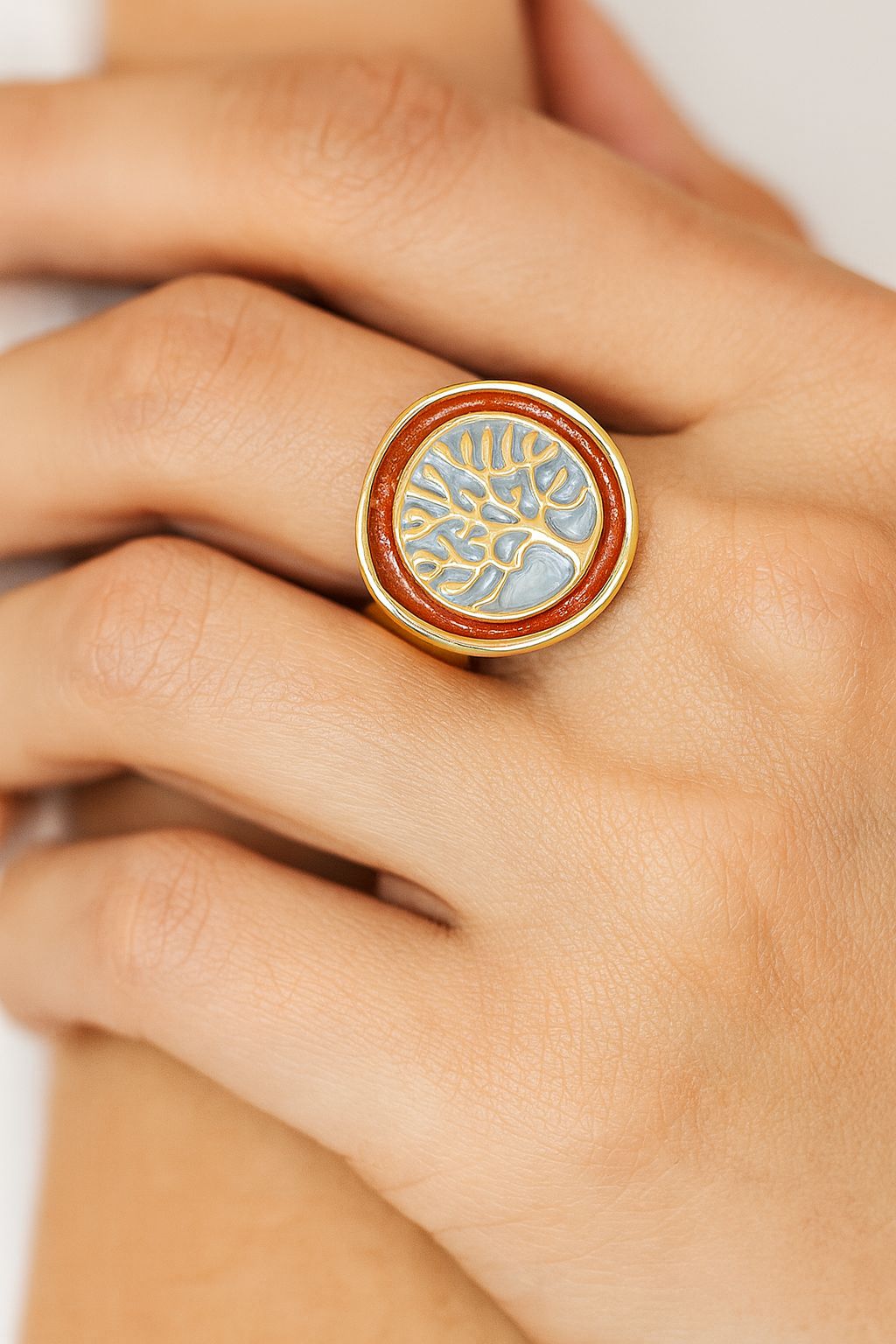 Close-up detail of hand-painted life tree artisan ring