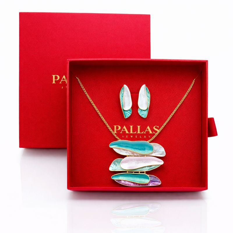 Model wearing hand painted enamel necklace and earrings set