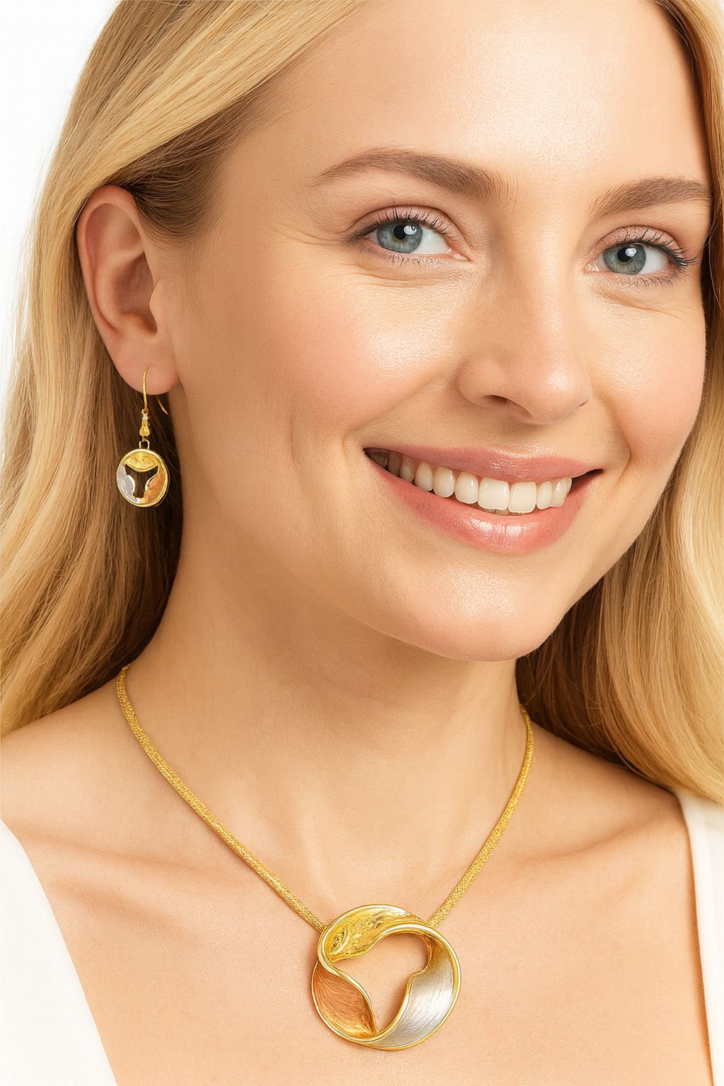 Pallas Jewelry gift box with abstract circle pendant necklace and earrings