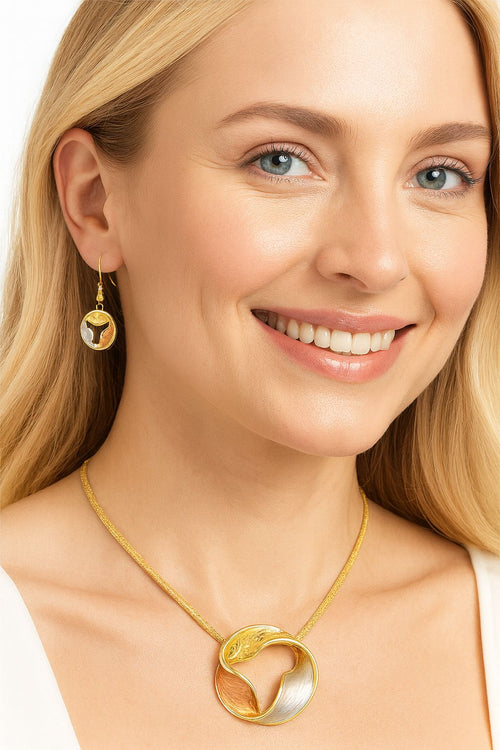 Pallas Jewelry gift box with abstract circle pendant necklace and earrings