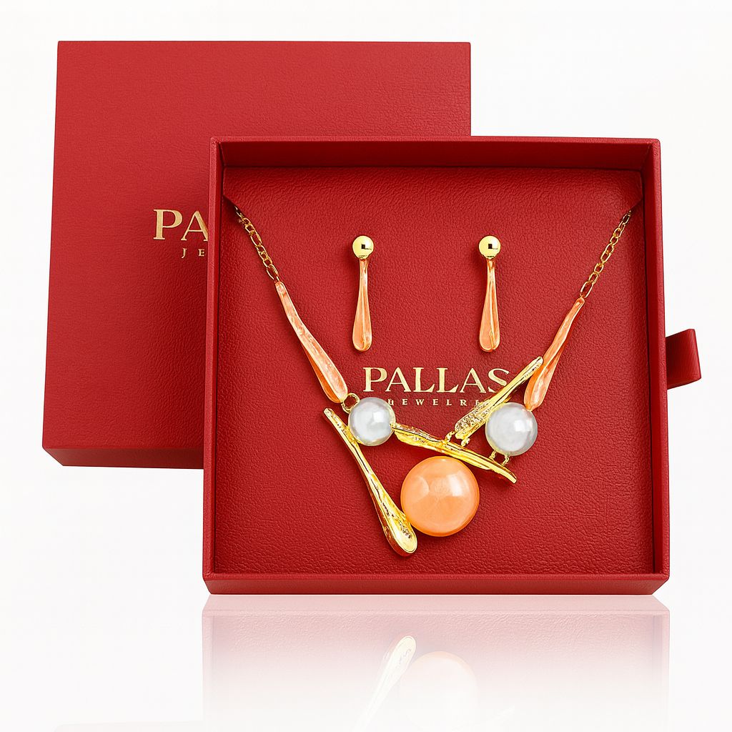 KC gold plated artistic jewelry set displayed in red gift box