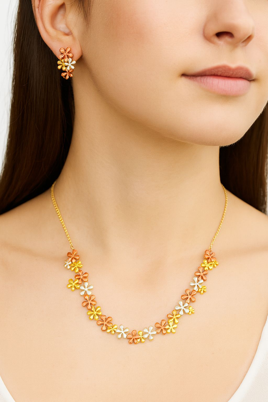 Model wearing the floral KC gold plated necklace and earrings set