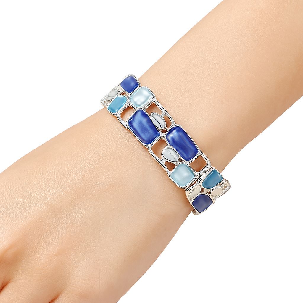 Modern geometric enamel bracelet on white background