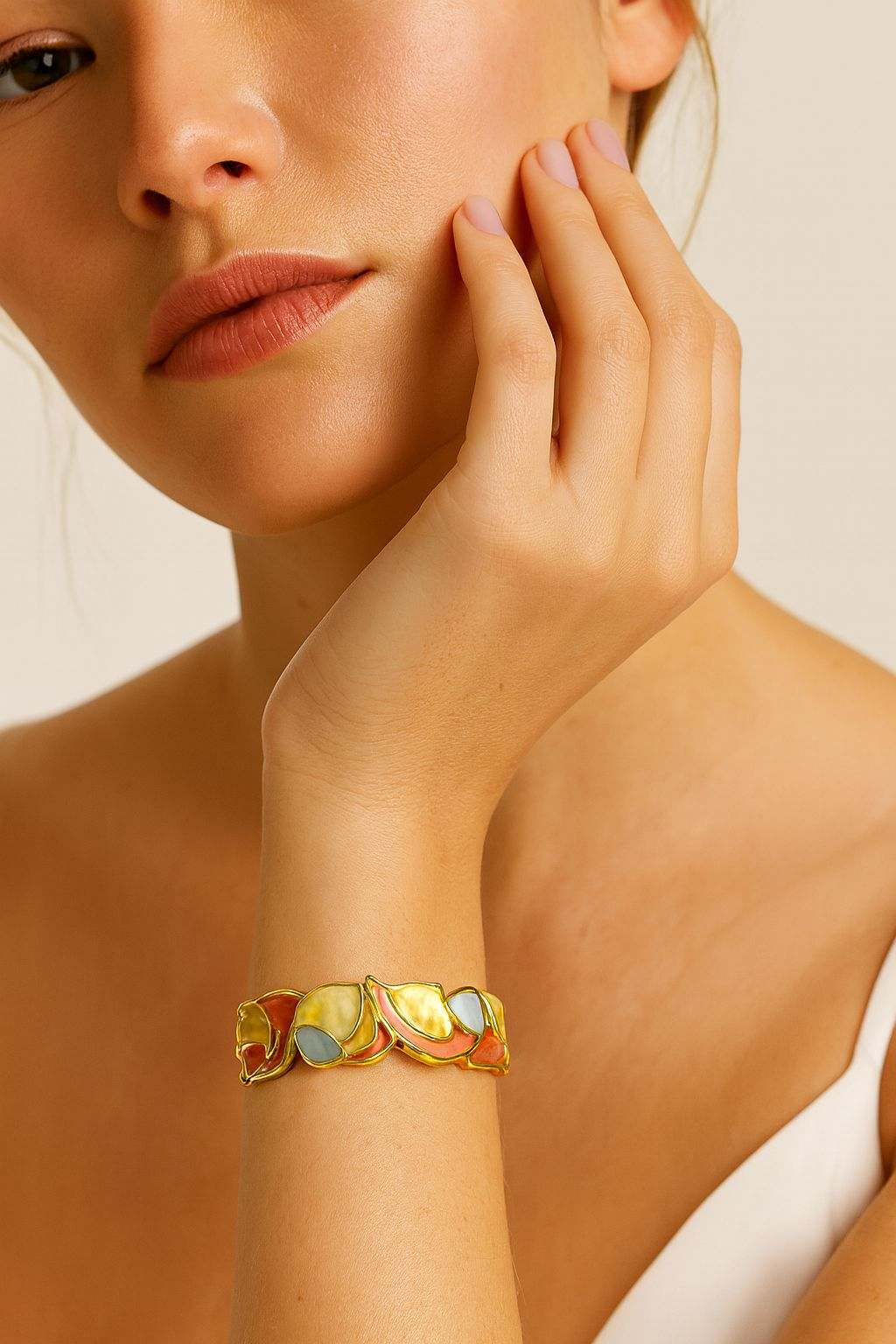 Modern art inspired gold bangle with coral and pearl enamel
