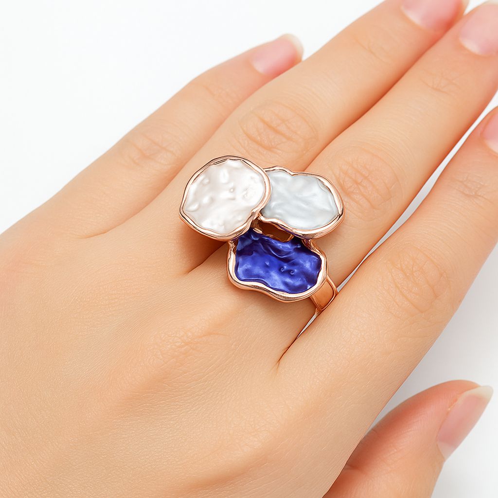 Abstract enamel cloud ring with KC gold plating worn on finger