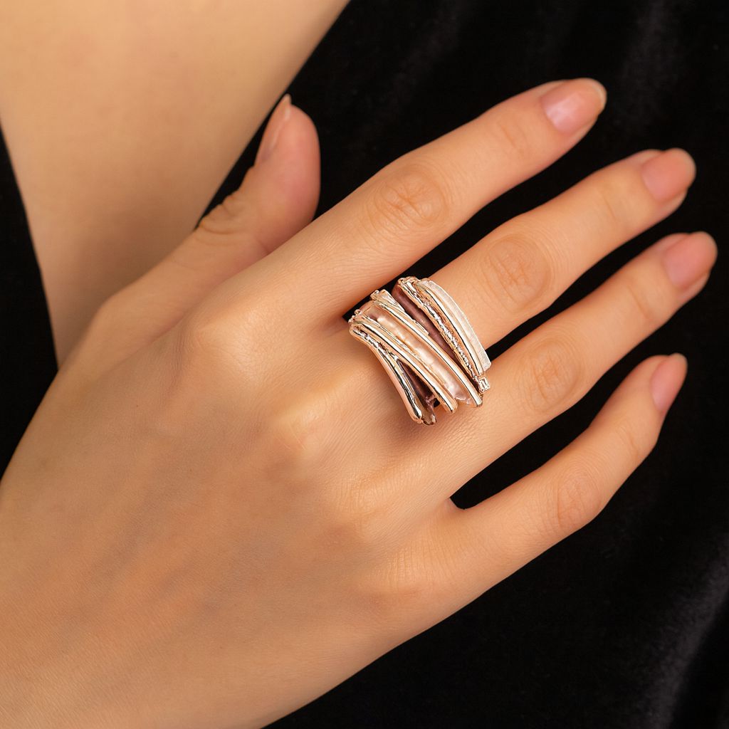 Modern layered gold fashion ring with sculptural texture