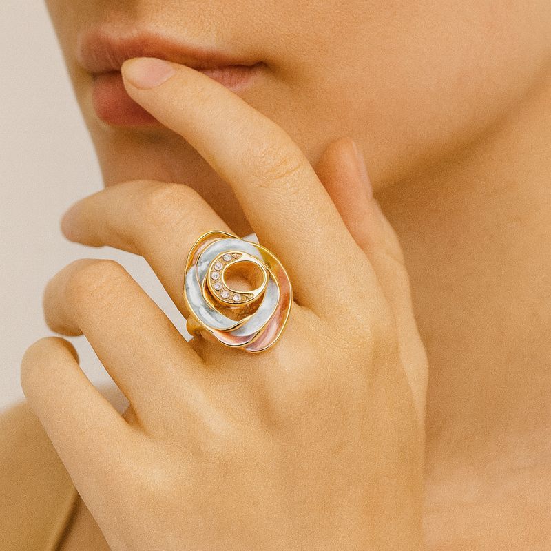 Close-up of hand-painted enamel texture on KC gold plated statement ring