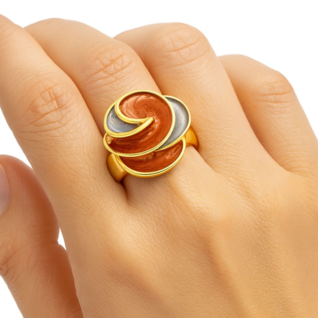 Women wearing artistic swirl statement ring in KC gold plating