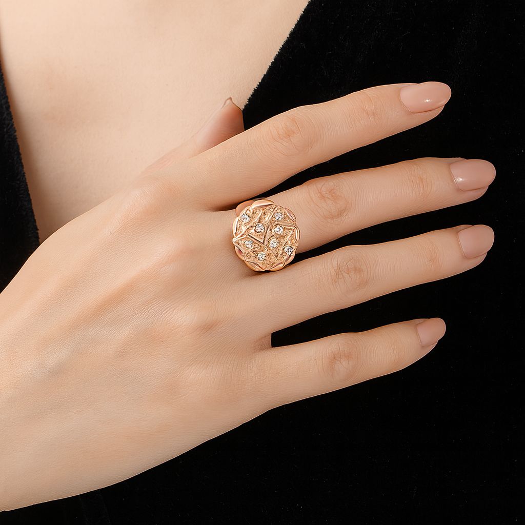 Textured crystal dome ring worn on finger with gold finish