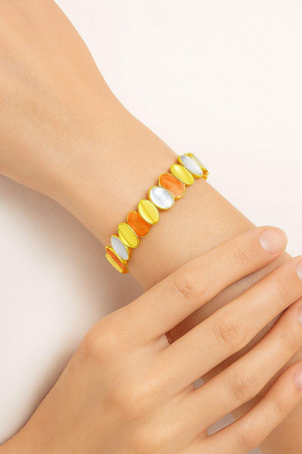 Lightweight artistic gold bracelet with handcrafted enamel details