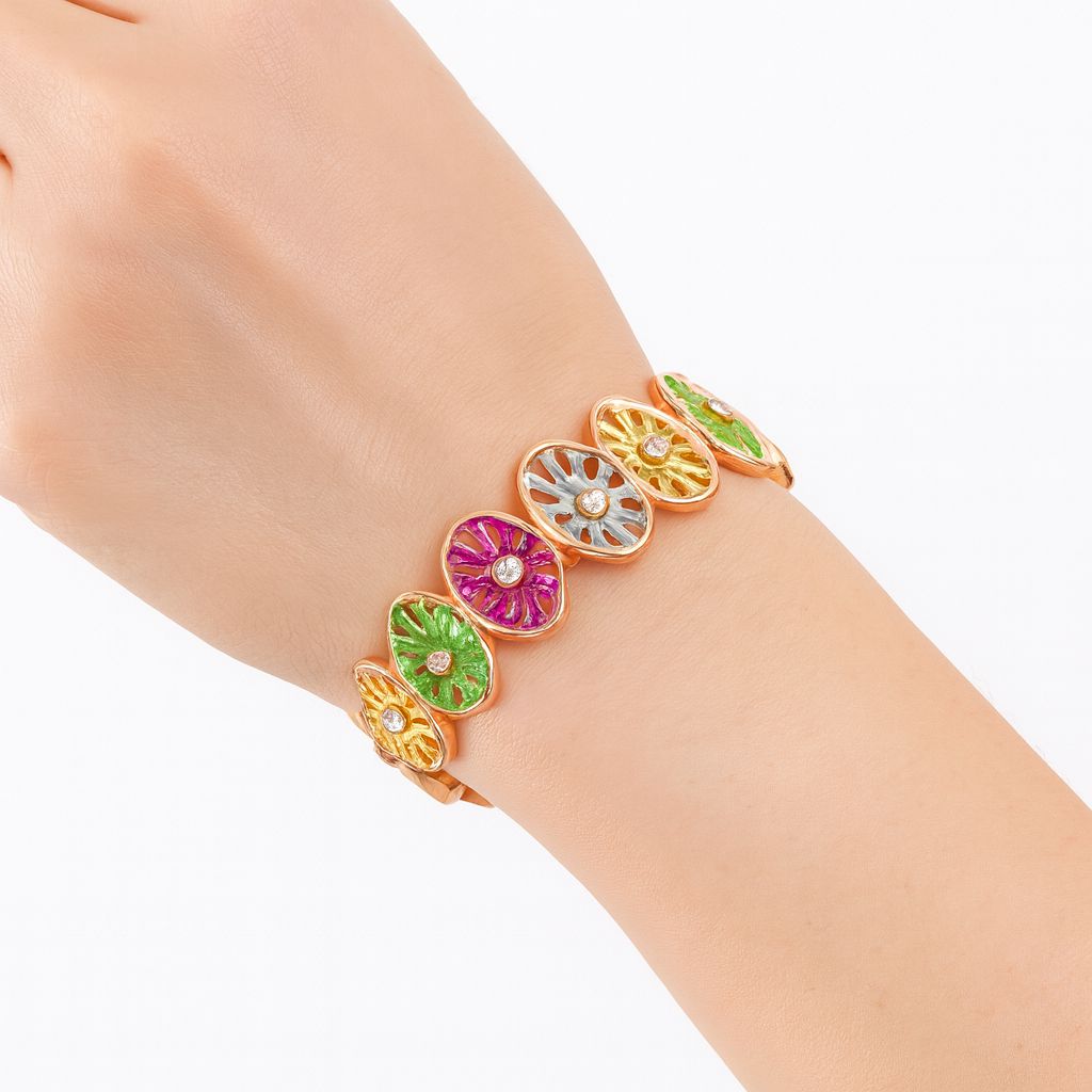 Model wearing multicolor hand-painted enamel bracelet, gold plated bangle