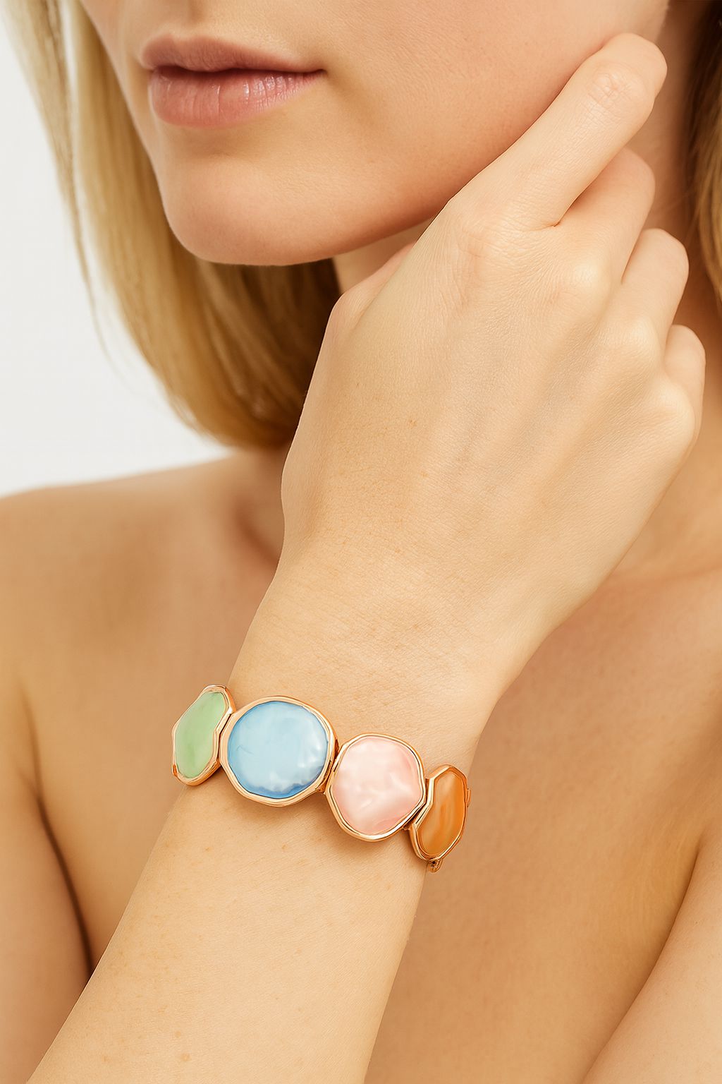 KC gold fashion bracelet worn on wrist – model display