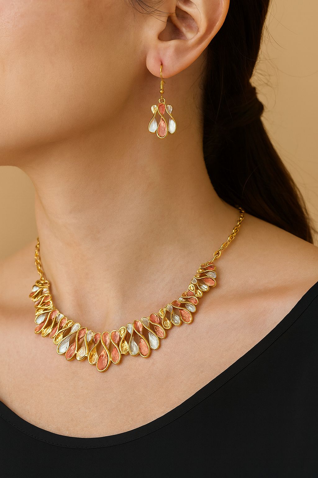 Close-up multicolor waterdrop necklace with textured finish