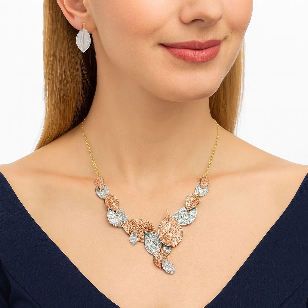 Artistic leaf earrings with textured finish in mixed metallic colors