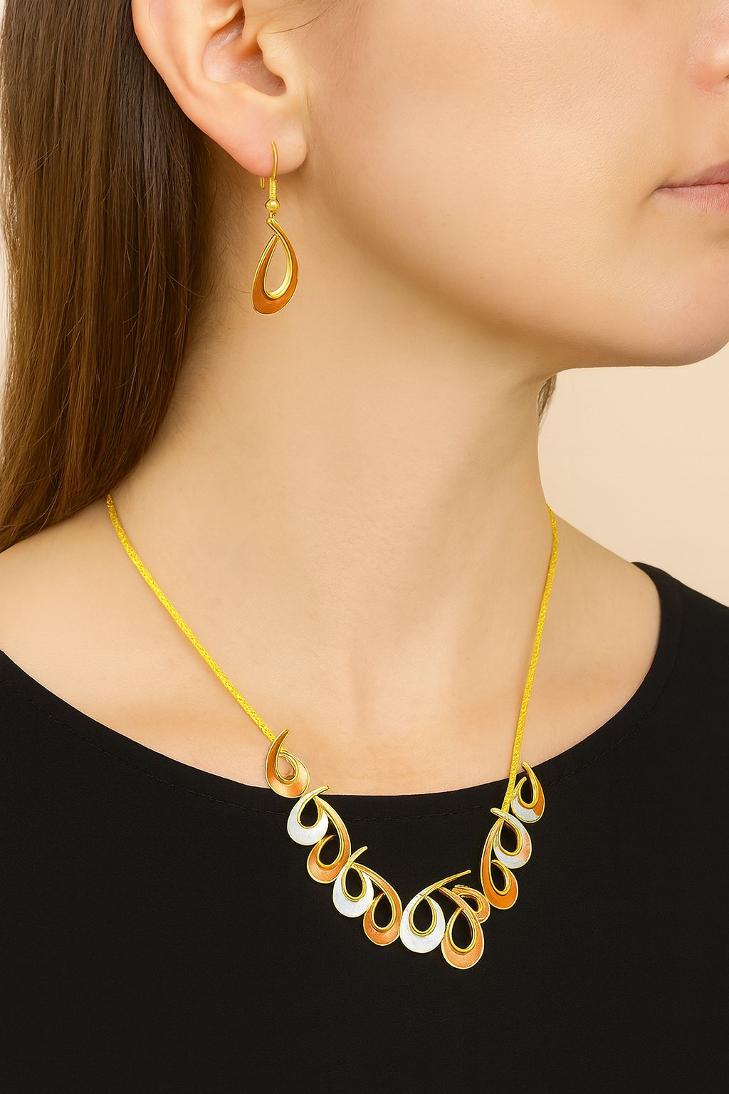 Artistic teardrop enamel pendant close-up