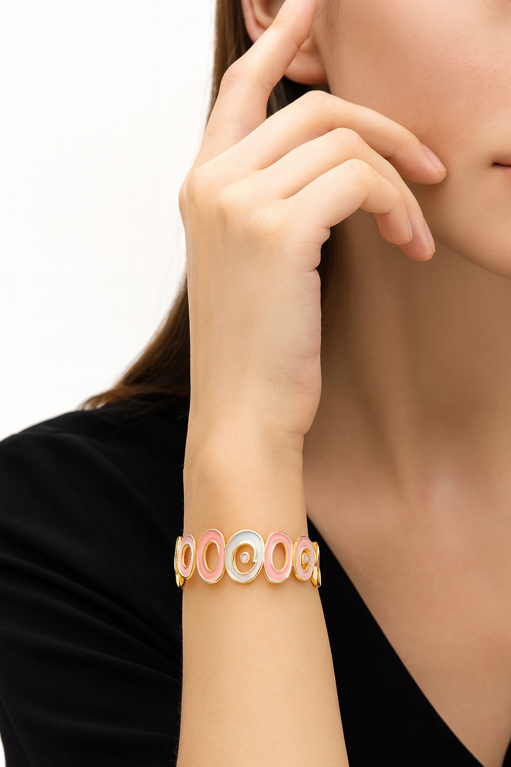 Side view of hand-painted pastel heart bracelet with KC gold plating