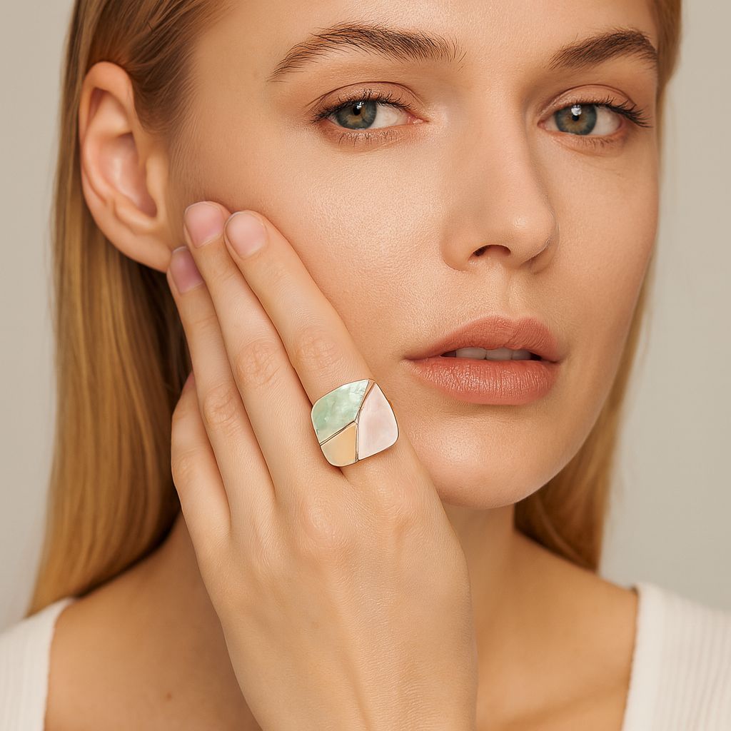 Pastel geometric color block ring worn on finger