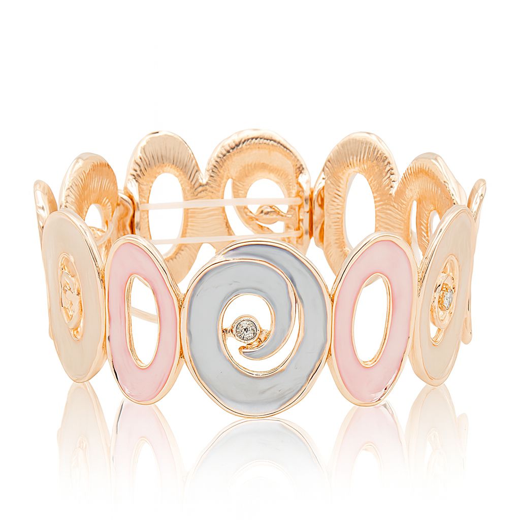 “Model wearing pastel enamel heart bracelet in pink and blue tones”