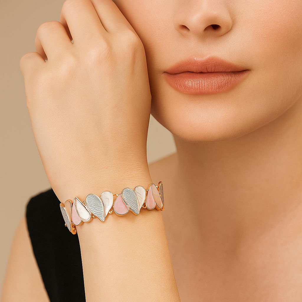 Model wearing romantic pastel heart bracelet with KC gold plating
