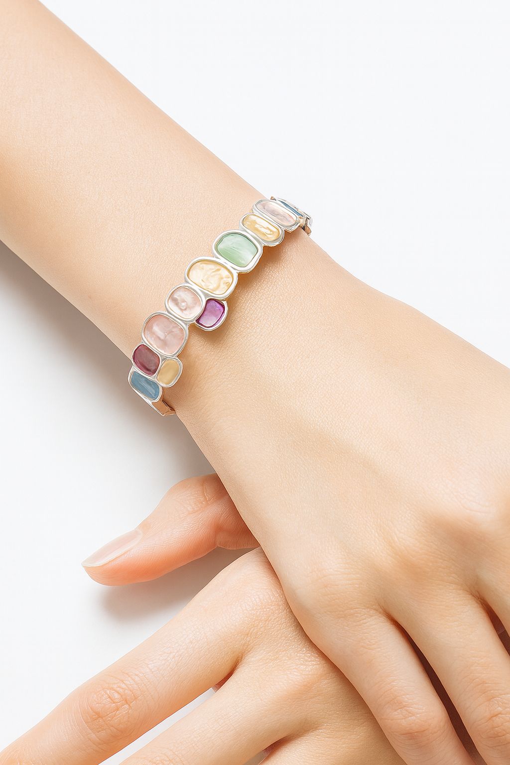 KC gold plated alloy bracelet with soft pastel stones"