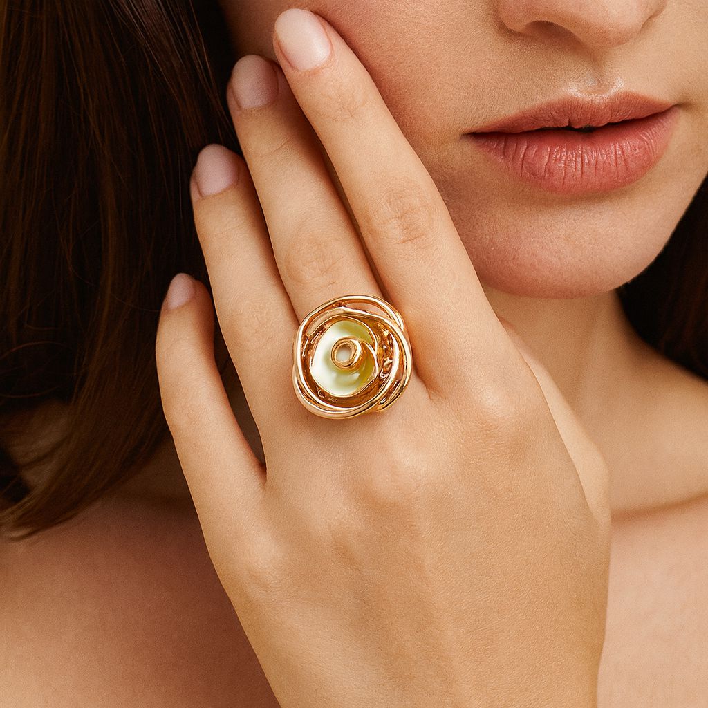 Elegant mother of pearl gold ring worn on finger