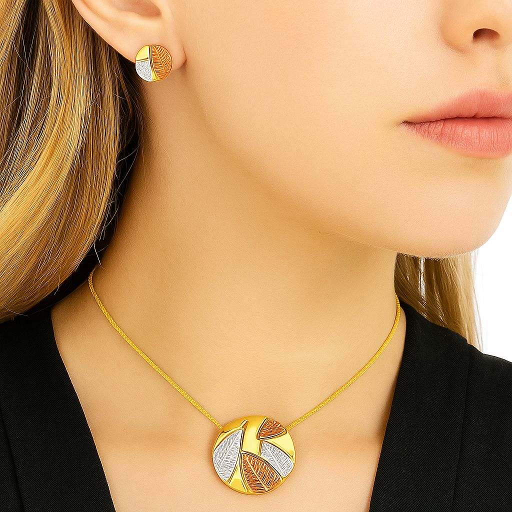 Tricolor gold, silver, and orange leaf design pendant necklace and earrings set on woman