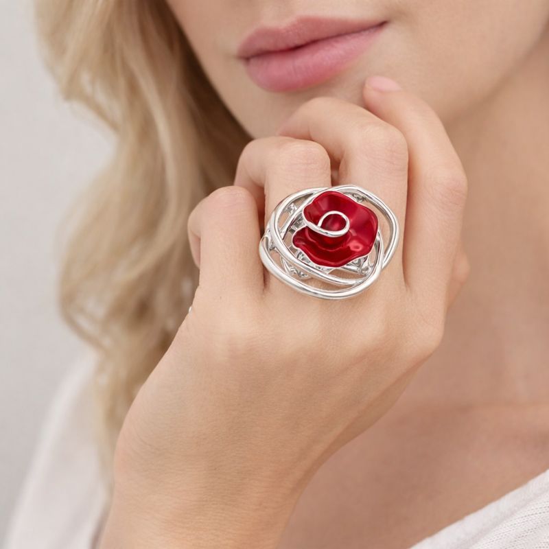 Romantic rose design enamel silver ring worn by woman
