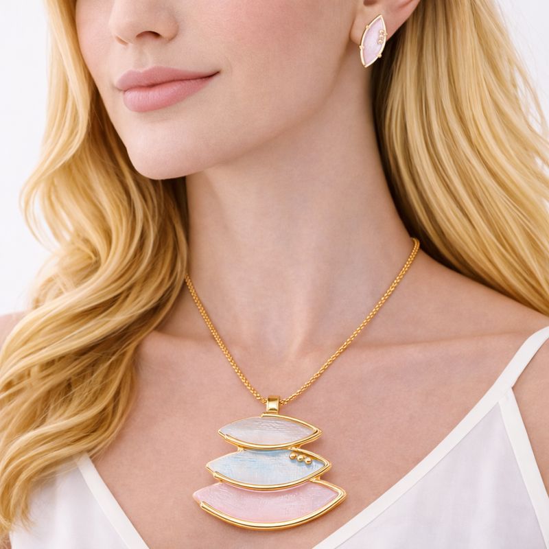 Statement necklace and earrings worn by model