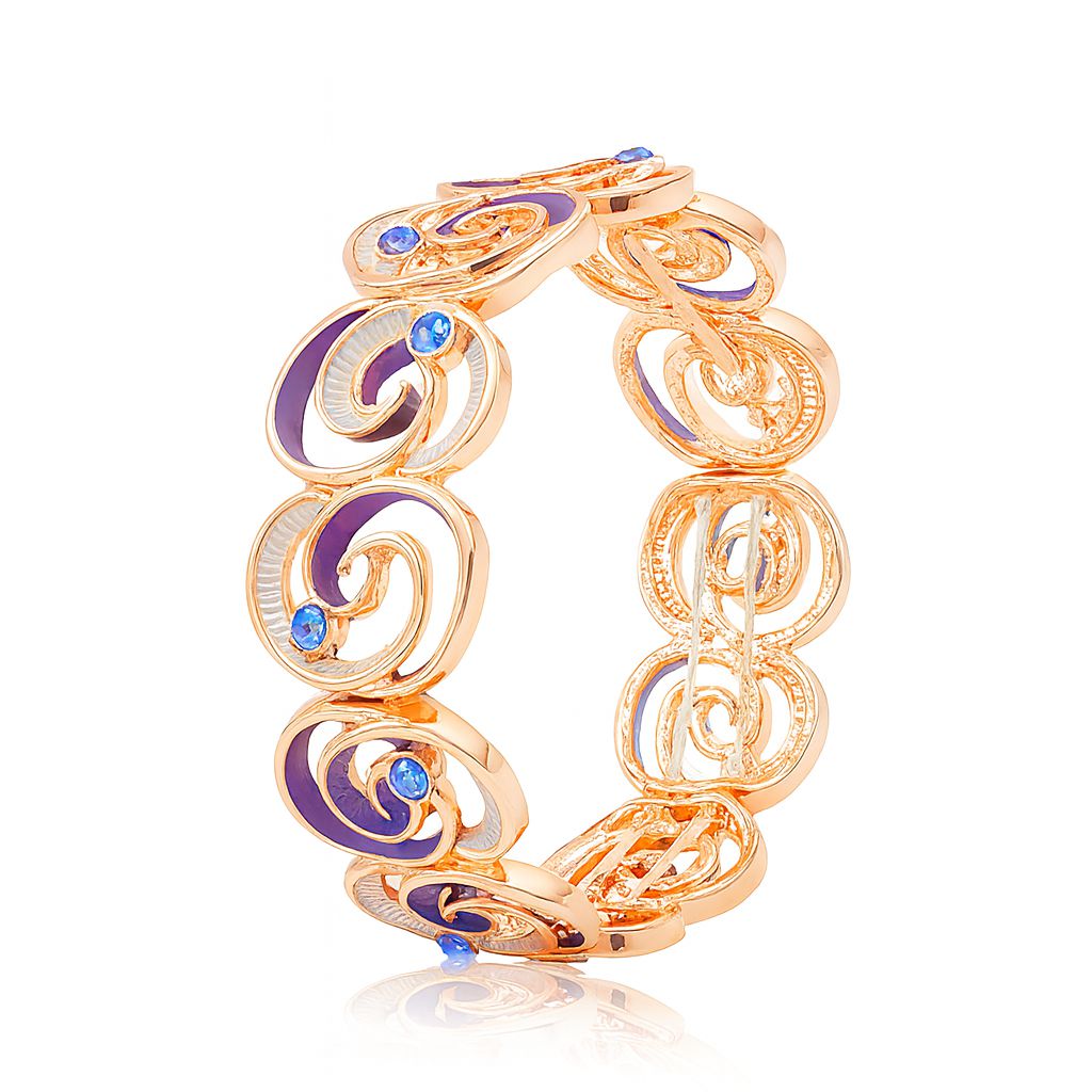 "KC gold plated swirl bangle bracelet with blue crystals"