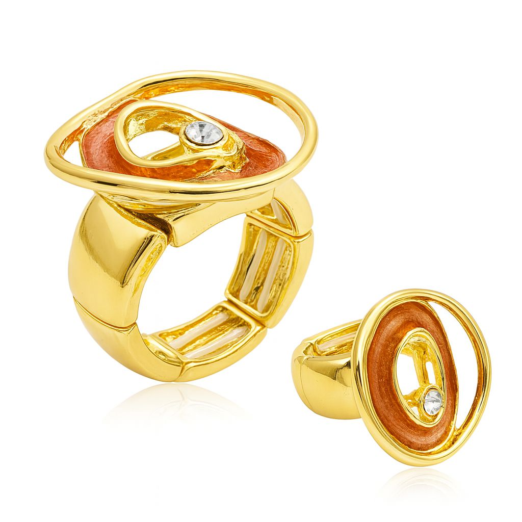 Hand wearing KC gold enamel swirl statement ring for women