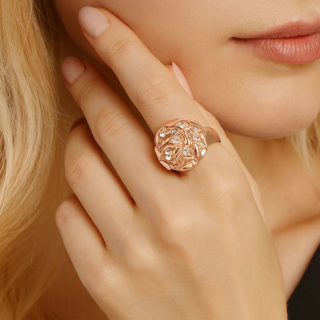 Modern textured gold dome ring with subtle crystal details
