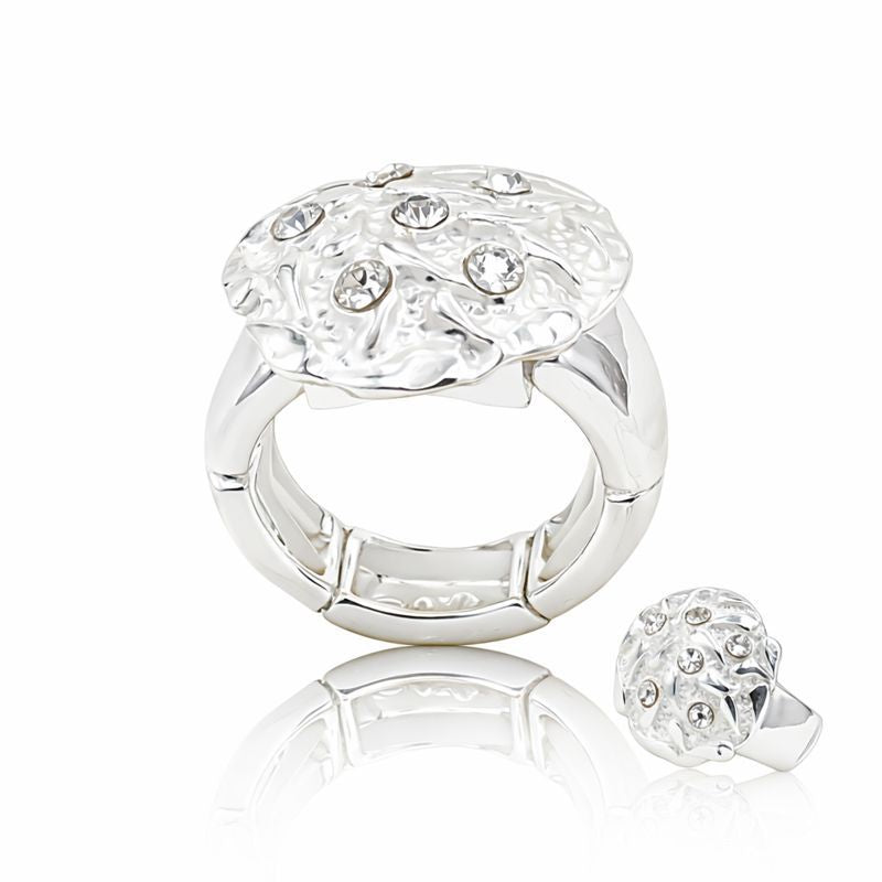 Textured crystal silver ring worn on hand with sculptural design