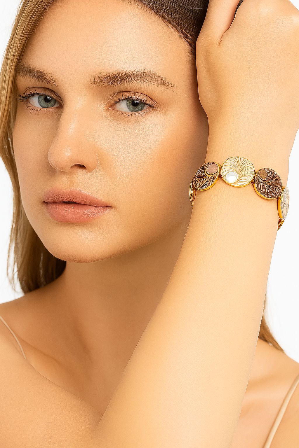 Detail shot of hand-crafted enamel medallion bracelet for women