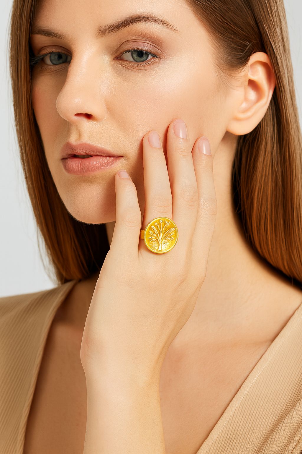 Adjustable Tree of Life gold ring worn on hand with artistic enamel details