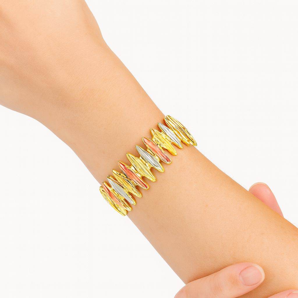 Stretch fit enamel gold bracelet detail