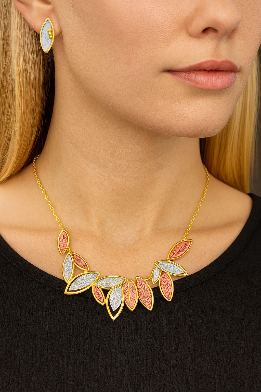KC gold plated leaf-shaped pendant necklace and earrings