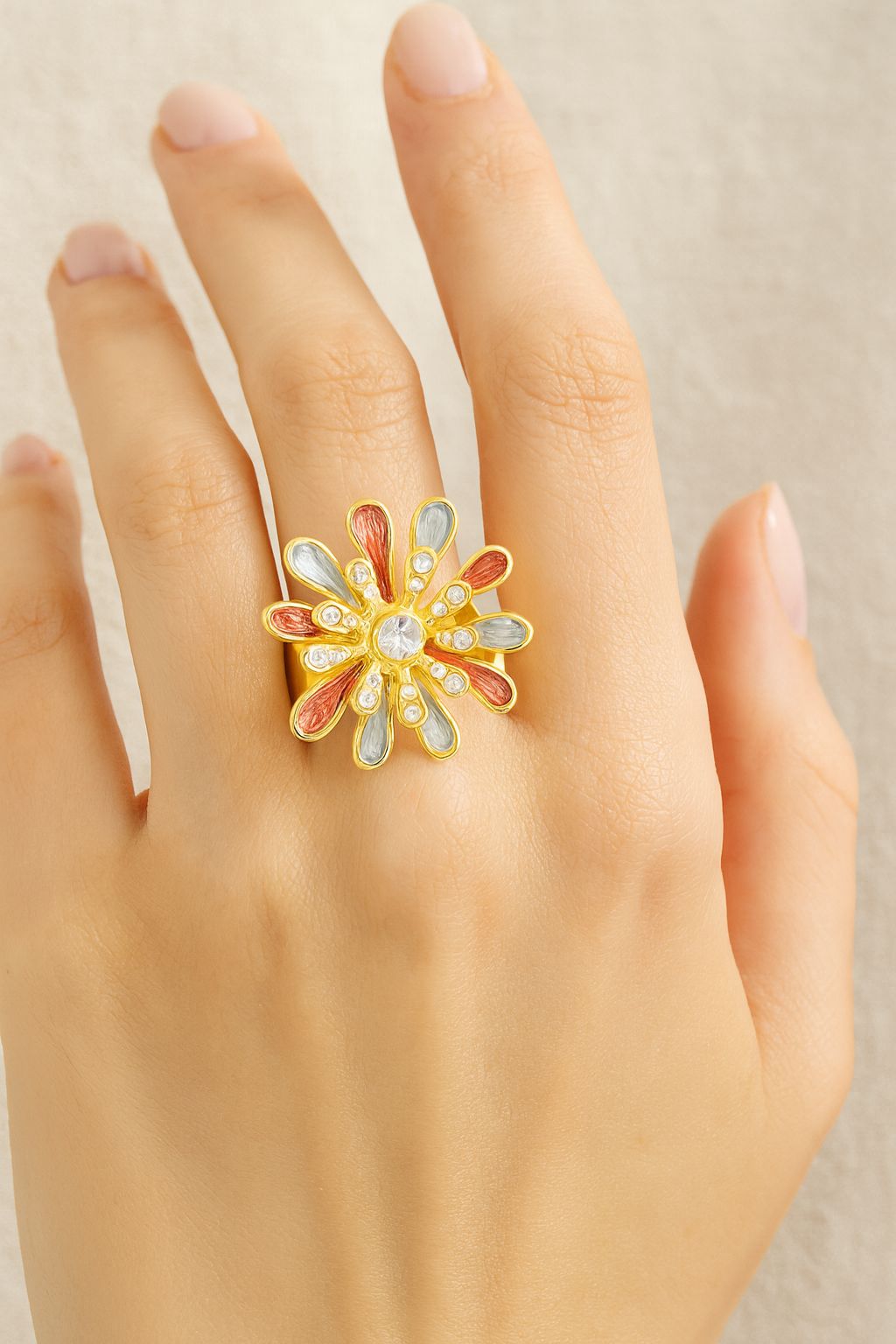 “Model wearing multicolor floral petal statement ring with crystal accents
