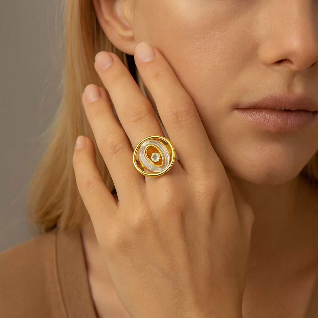 Woman wearing artistic dual-tone spiral statement ring